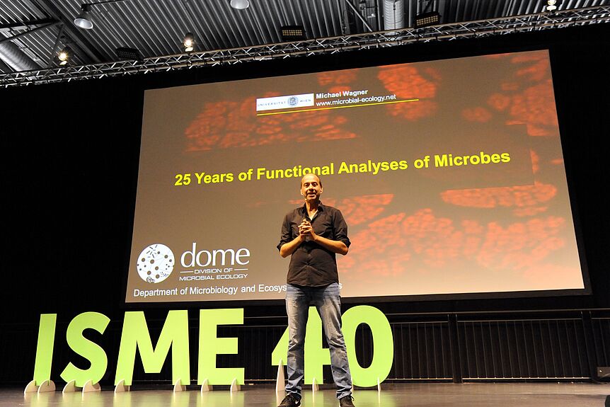 Michael Wagner on the stage of the ISME meeting