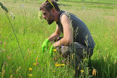 Andrew Giguere in a field